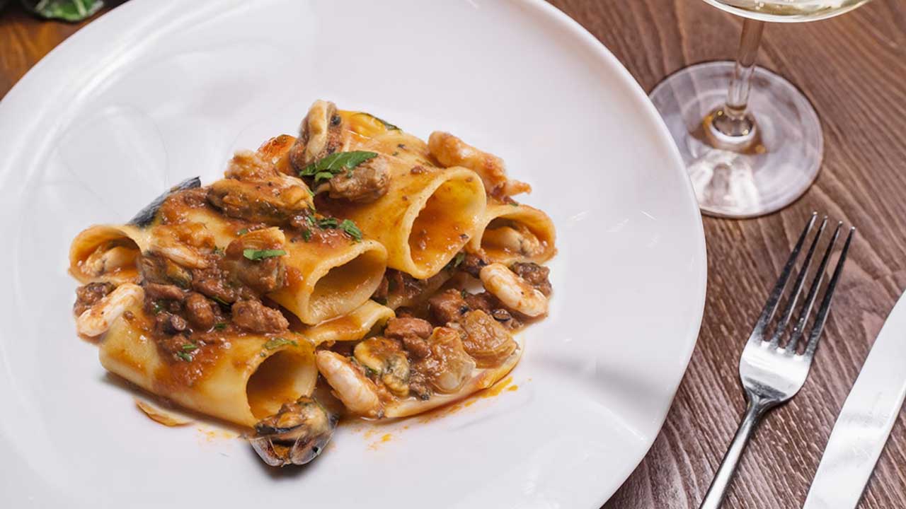https://www.siciliaexport.com/wp-content/uploads/2023/09/Paccheri-with-seafood-and-bisque.jpg
